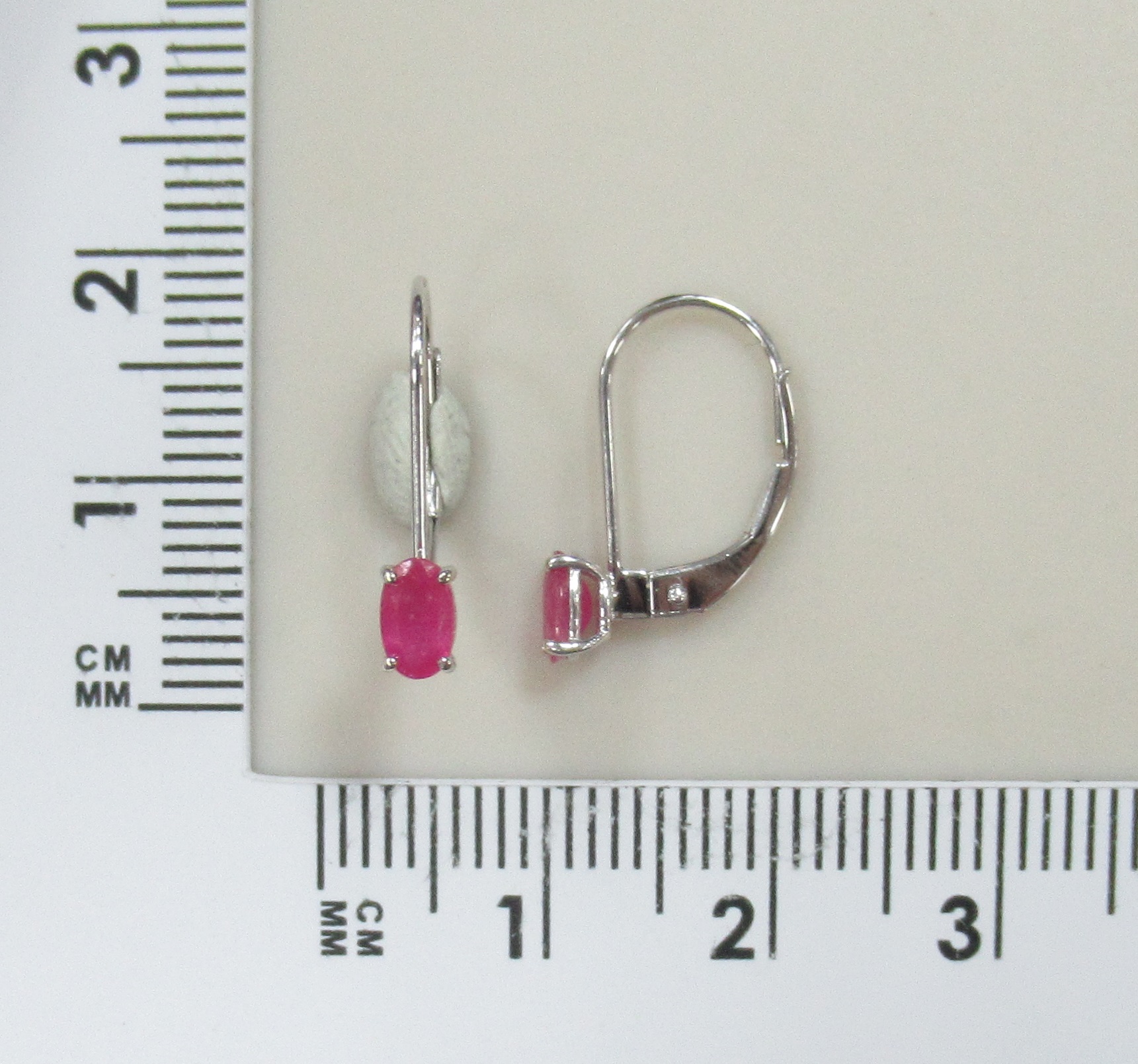 Серьги из белого золота с рубинами